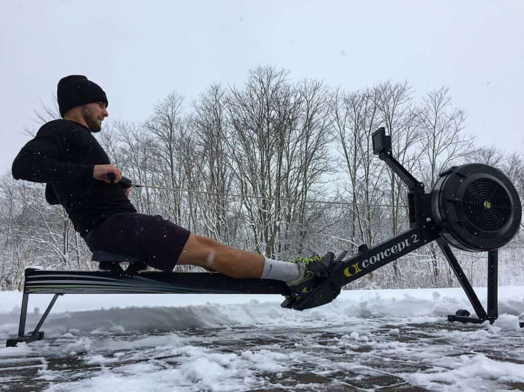 Post author riding Concept2 outside in the winter