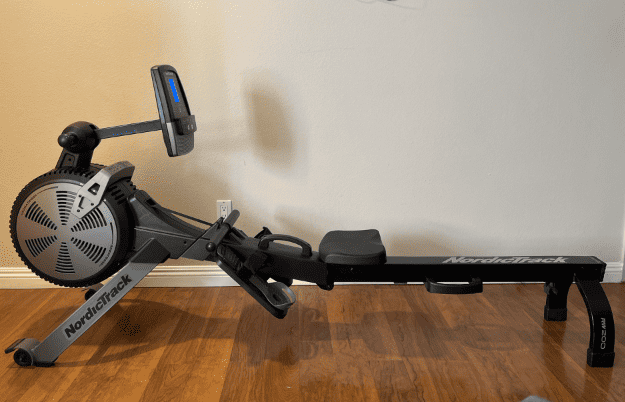 The NordicTrack RW200 rower in the living area of a home. 